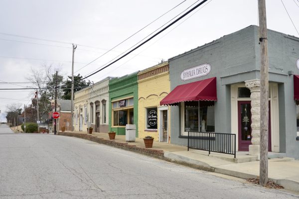 Historic downtown Byhalia, MS, featuring small-town charm, colorful storefronts, and a welcoming community. Professional lawn care services available in Byhalia and surrounding Mid-South areas