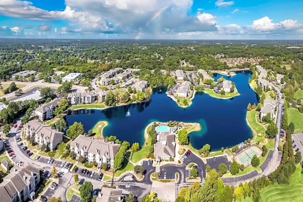 Aerial view of Cordova, TN, featuring beautiful lakes, luxury apartments, and lush green landscapes. Expert lawn care services available in Cordova and surrounding Mid-South areas