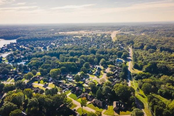 Aerial view of Lakeland, TN, showcasing lush greenery, residential neighborhoods, and well-maintained landscapes. Professional lawn care services available in Lakeland and surrounding Mid-South areas.